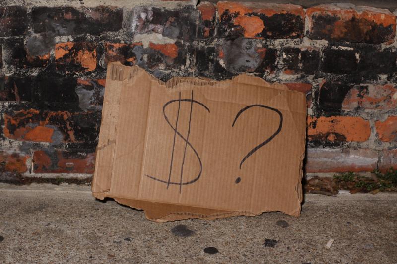 Picture of sign asking for money