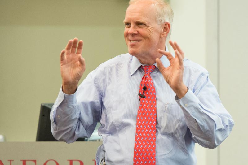 Stanford President John Hennessy speaks to participants in the Hollyhock Fellowship for Teachers program during their lunchtime session Tuesday. (Photo by LA Cicero)