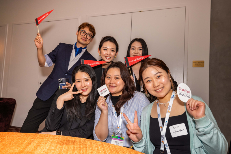 Group of GSE students and alumni at AERA 2025