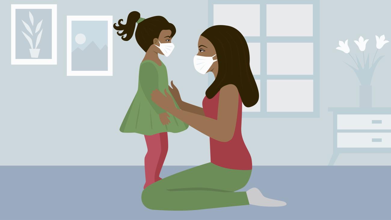 Image of a young girl and her mother with masks on