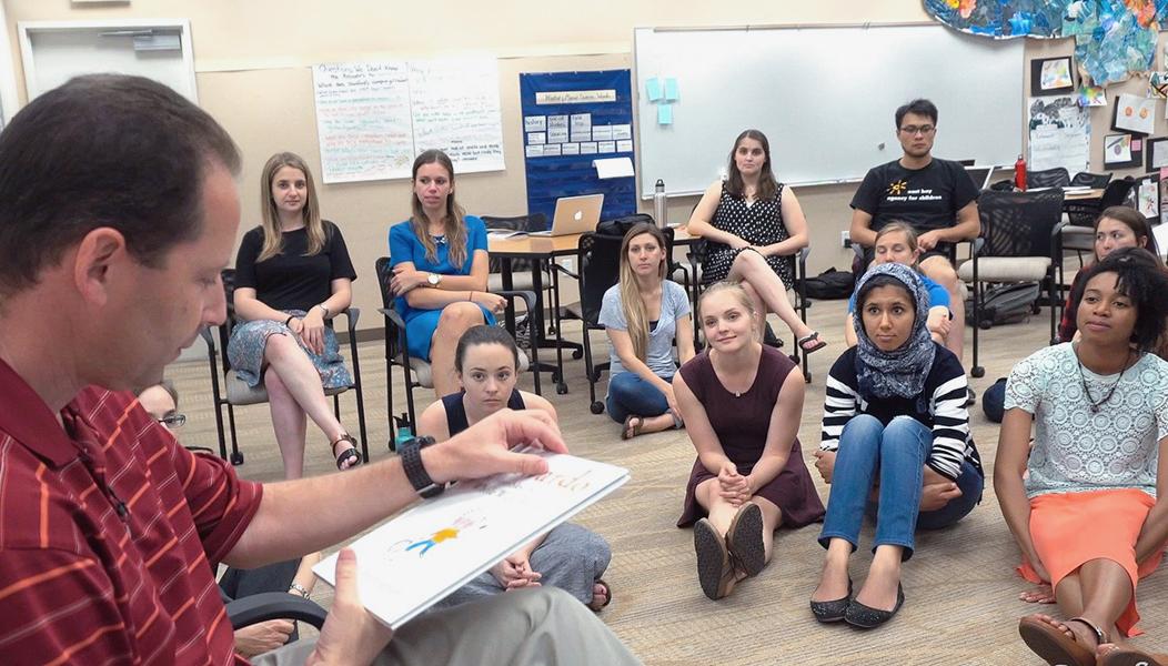 Photo of Ira Lit with STEP teacher candidates