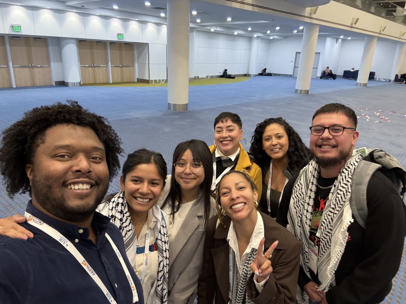 Darion Wallace (far left) poses with fellow scholars at the 2025 AERA conference.