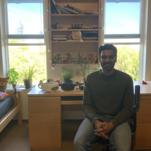 Aditya Vishwanath, sitting in his room hear his desk
